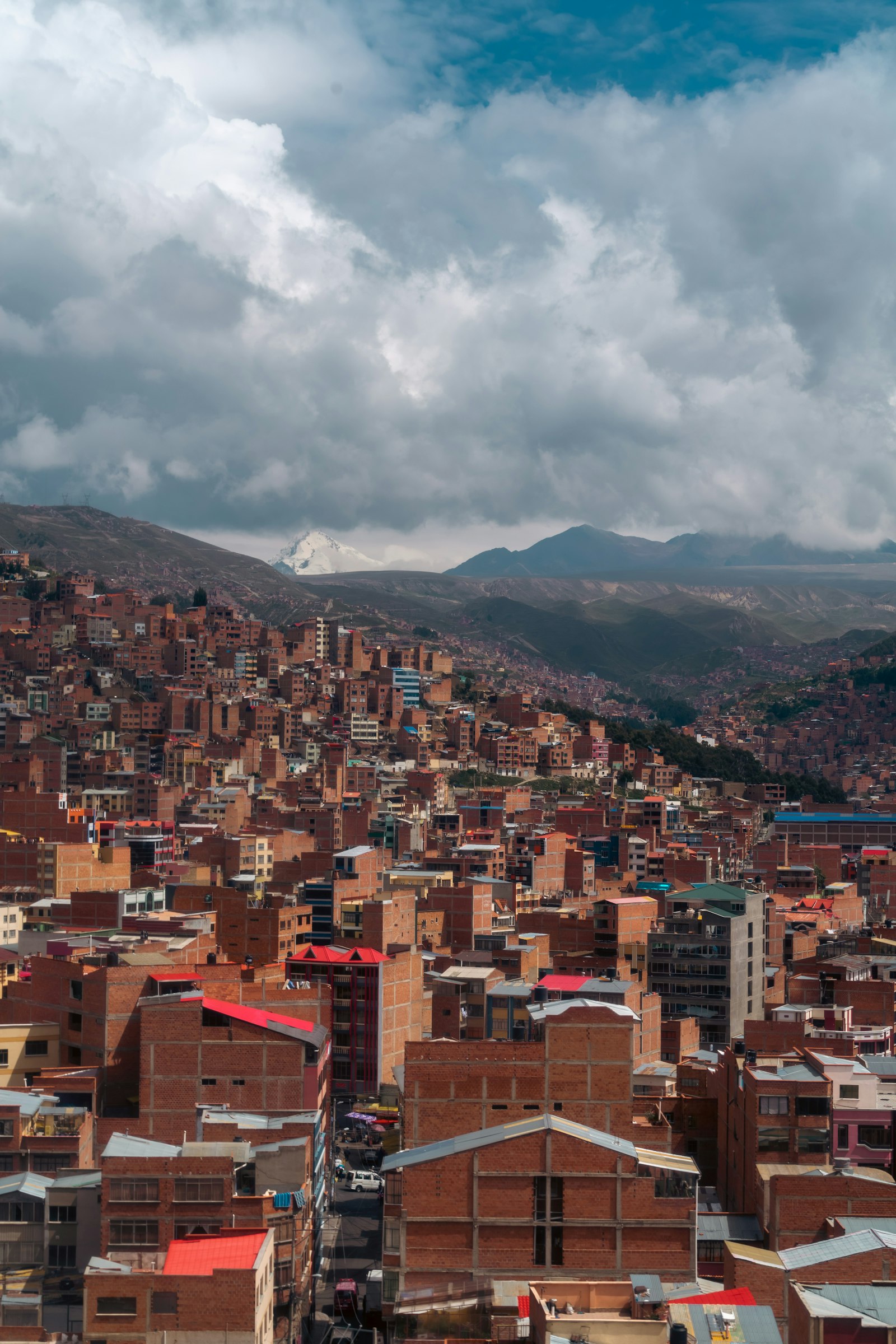 Aerial view of La Paz with high-rise buildings and mountains