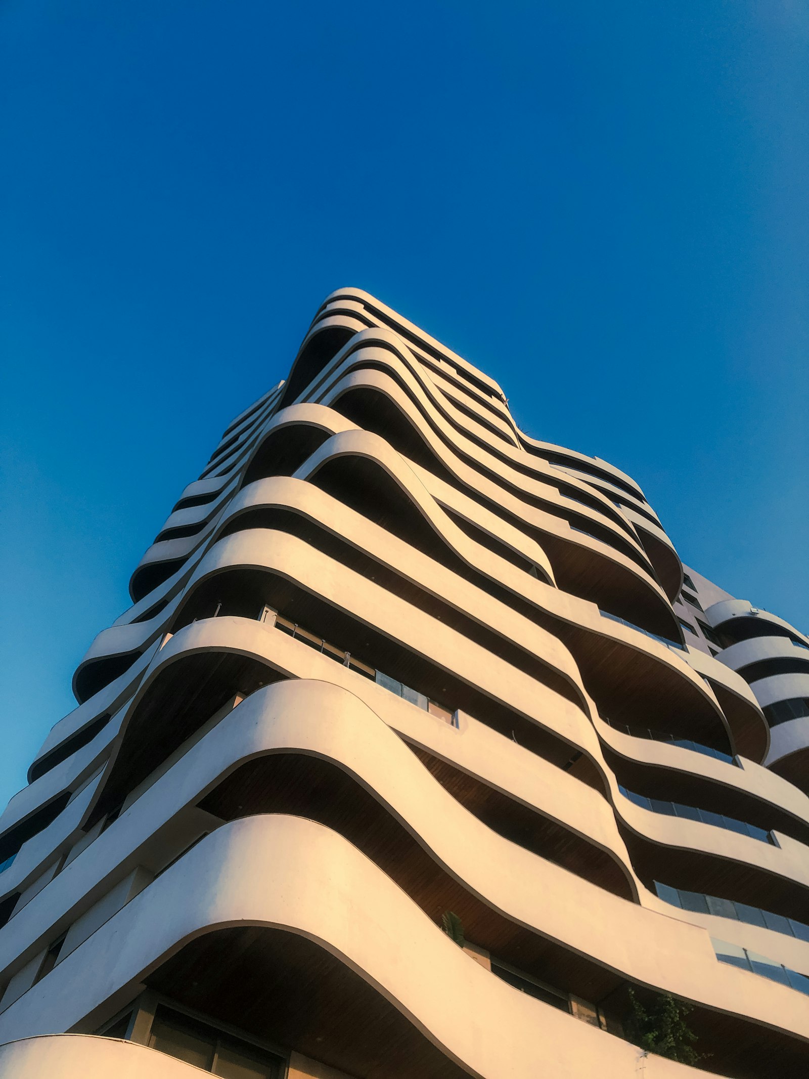 High-rise residential tower in Bolivia at sunset